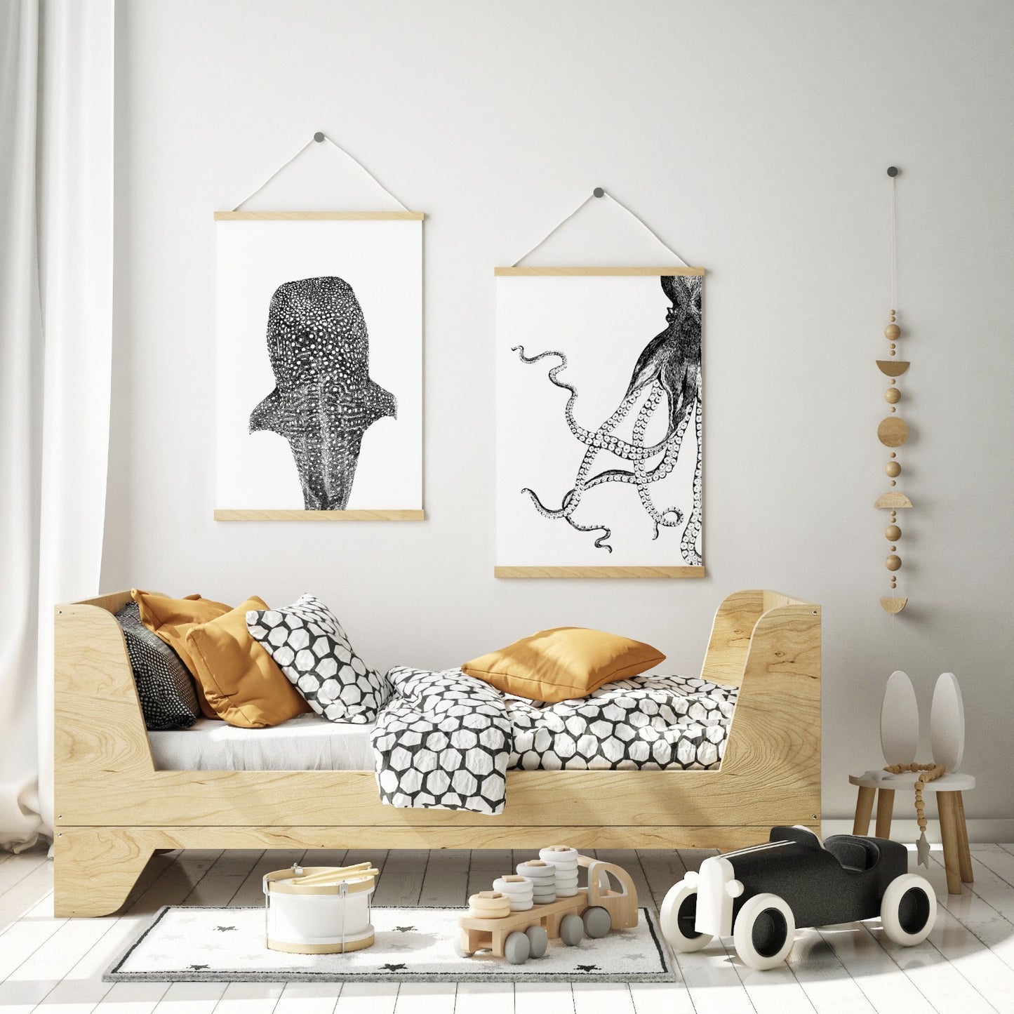 bamber prints whale shark and octopus black and white prints in stylish scandi bedroom
